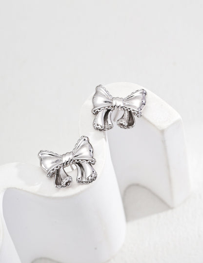 Boucles d'oreilles en argent sterling plaqué or 18 carats en forme de nœud pour Noël